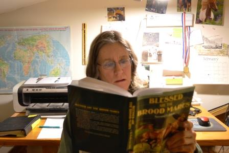 Alys reading in her study
